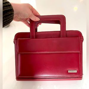 Franklin covey red weekly organizer.